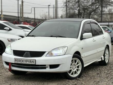 Білий Міцубісі Lancer, об'ємом двигуна 1.6 л та пробігом 301 тис. км за 3300 $, фото 1 на Automoto.ua