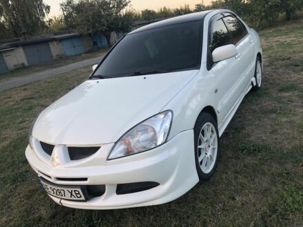 Мицубиси Лансер 2006 в Терновке на Automoto.ua Белый Мицубиси Лансер, объемом двигателя 1.6 л и пробегом 292 тыс. км за 2600 $, фото 1 на Automoto.ua