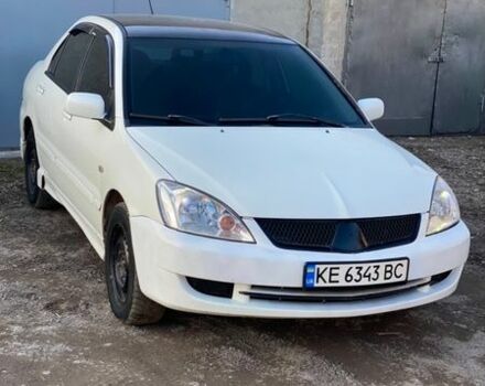 Белый Мицубиси Лансер, объемом двигателя 1.6 л и пробегом 250 тыс. км за 2999 $, фото 1 на Automoto.ua
