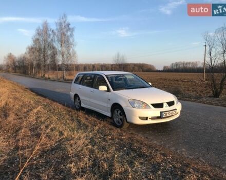 Білий Міцубісі Lancer, об'ємом двигуна 1.6 л та пробігом 231 тис. км за 4300 $, фото 1 на Automoto.ua