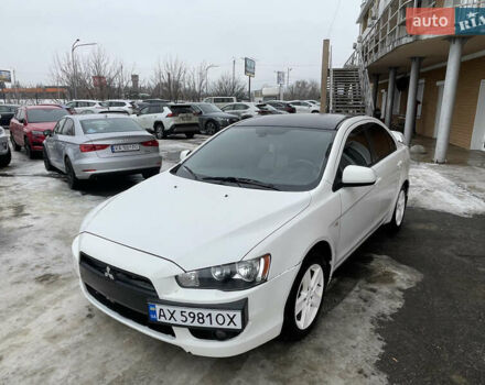 Белый Мицубиси Лансер, объемом двигателя 2 л и пробегом 224 тыс. км за 7400 $, фото 1 на Automoto.ua