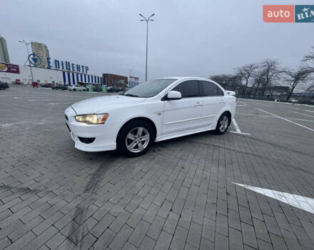 Белый Мицубиси Лансер, объемом двигателя 1.5 л и пробегом 314 тыс. км за 6500 $, фото 1 на Automoto.ua