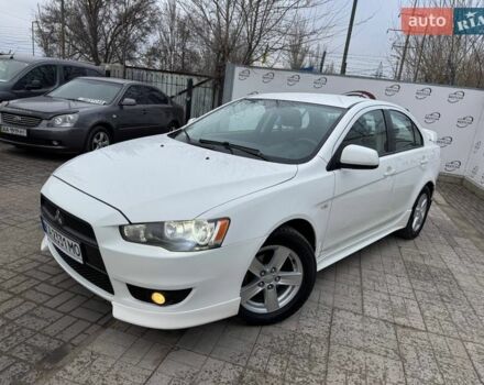Белый Мицубиси Лансер, объемом двигателя 2 л и пробегом 260 тыс. км за 6700 $, фото 1 на Automoto.ua