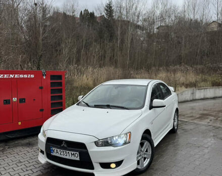 Белый Мицубиси Лансер, объемом двигателя 2 л и пробегом 259 тыс. км за 6300 $, фото 1 на Automoto.ua