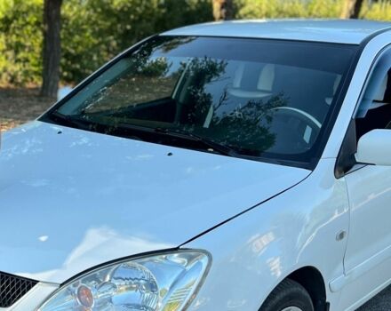 Белый Мицубиси Лансер, объемом двигателя 1.6 л и пробегом 200 тыс. км за 4600 $, фото 1 на Automoto.ua