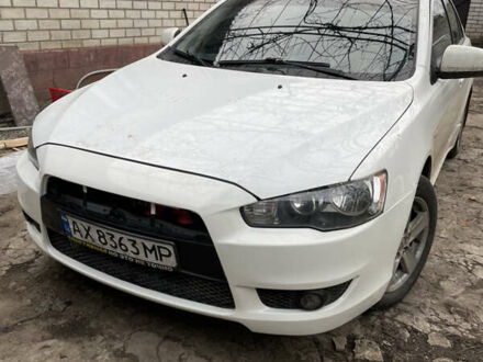 Білий Міцубісі Lancer, об'ємом двигуна 2 л та пробігом 250 тис. км за 7000 $, фото 1 на Automoto.ua