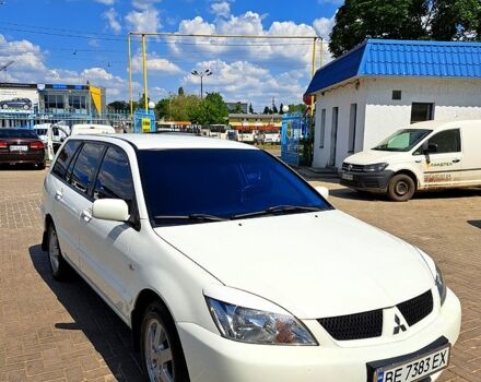 Білий Міцубісі Lancer, об'ємом двигуна 1.6 л та пробігом 200 тис. км за 5500 $, фото 1 на Automoto.ua