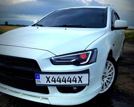 Белый Мицубиси Лансер, объемом двигателя 2 л и пробегом 188 тыс. км за 7800 $, фото 1 на Automoto.ua