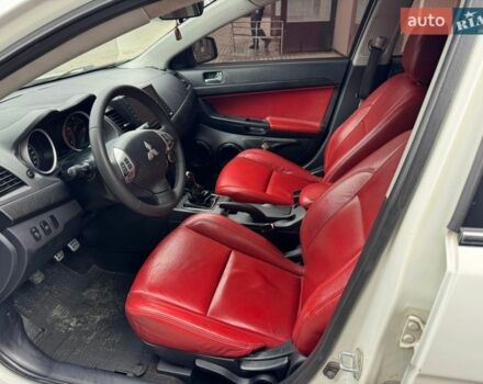 Белый Мицубиси Лансер, объемом двигателя 2 л и пробегом 230 тыс. км за 7300 $, фото 1 на Automoto.ua