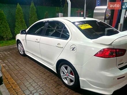 Білий Міцубісі Lancer, об'ємом двигуна 2 л та пробігом 254 тис. км за 5850 $, фото 1 на Automoto.ua