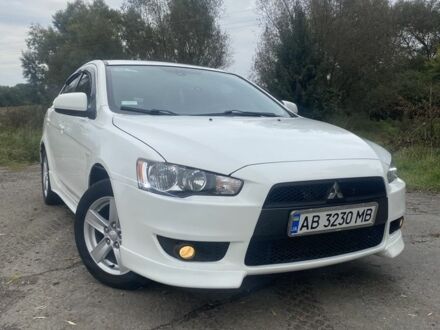 Білий Міцубісі Lancer, об'ємом двигуна 2 л та пробігом 296 тис. км за 6199 $, фото 1 на Automoto.ua