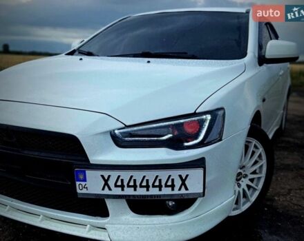 Белый Мицубиси Лансер, объемом двигателя 2 л и пробегом 188 тыс. км за 7800 $, фото 1 на Automoto.ua