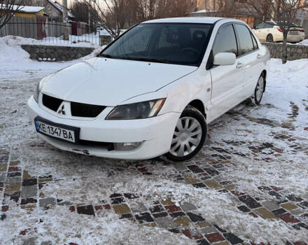 Белый Мицубиси Лансер, объемом двигателя 1.58 л и пробегом 293 тыс. км за 3800 $, фото 1 на Automoto.ua