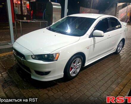 Белый Мицубиси Лансер, объемом двигателя 2 л и пробегом 254 тыс. км за 5850 $, фото 1 на Automoto.ua