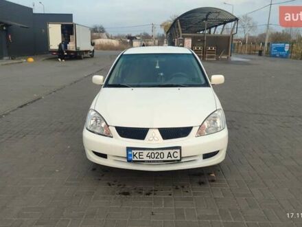 Білий Міцубісі Lancer, об'ємом двигуна 1.58 л та пробігом 250 тис. км за 4400 $, фото 1 на Automoto.ua