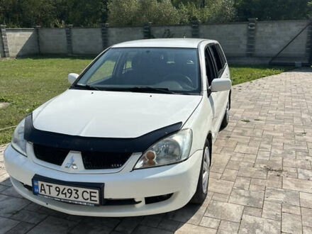 Белый Мицубиси Лансер, объемом двигателя 1.6 л и пробегом 147 тыс. км за 3100 $, фото 1 на Automoto.ua