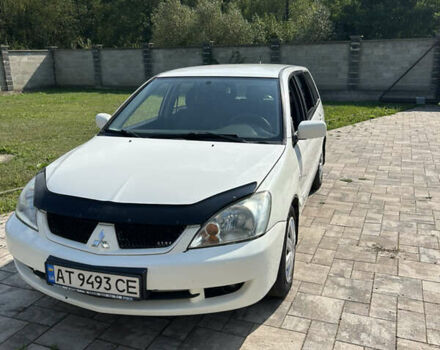 Белый Мицубиси Лансер, объемом двигателя 1.6 л и пробегом 147 тыс. км за 3100 $, фото 1 на Automoto.ua