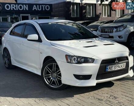 Білий Міцубісі Lancer, об'ємом двигуна 1.8 л та пробігом 185 тис. км за 8500 $, фото 1 на Automoto.ua