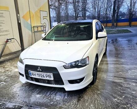 Белый Мицубиси Лансер, объемом двигателя 2 л и пробегом 208 тыс. км за 7600 $, фото 1 на Automoto.ua