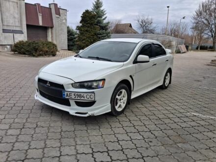 Білий Міцубісі Lancer, об'ємом двигуна 1.5 л та пробігом 247 тис. км за 6500 $, фото 1 на Automoto.ua