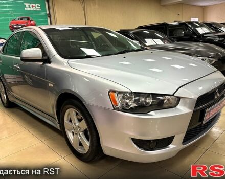 Белый Мицубиси Лансер, объемом двигателя 2 л и пробегом 172 тыс. км за 6300 $, фото 1 на Automoto.ua