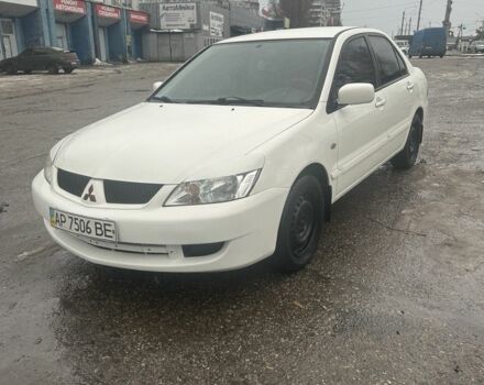 Белый Мицубиси Лансер, объемом двигателя 1.6 л и пробегом 250 тыс. км за 3500 $, фото 1 на Automoto.ua