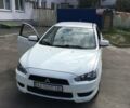 Білий Міцубісі Lancer, об'ємом двигуна 1.5 л та пробігом 187 тис. км за 7200 $, фото 1 на Automoto.ua