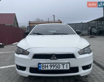 Белый Мицубиси Лансер, объемом двигателя 1.47 л и пробегом 196 тыс. км за 6900 $, фото 1 на Automoto.ua