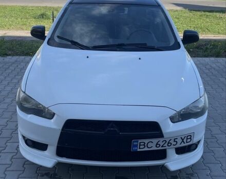 Белый Мицубиси Лансер, объемом двигателя 2 л и пробегом 230 тыс. км за 6000 $, фото 1 на Automoto.ua