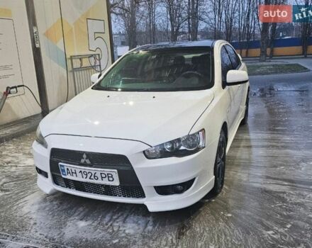 Белый Мицубиси Лансер, объемом двигателя 2 л и пробегом 208 тыс. км за 7600 $, фото 1 на Automoto.ua