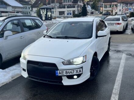 Белый Мицубиси Лансер, объемом двигателя 2 л и пробегом 256 тыс. км за 4900 $, фото 1 на Automoto.ua