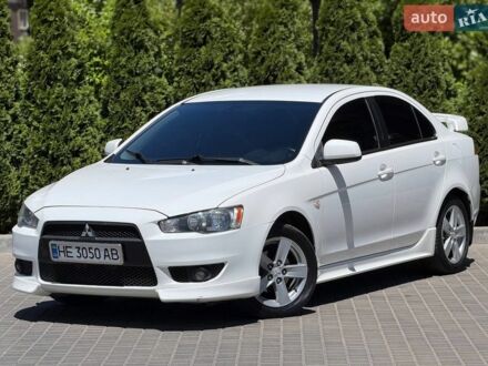 Білий Міцубісі Lancer, об'ємом двигуна 2 л та пробігом 258 тис. км за 7300 $, фото 1 на Automoto.ua