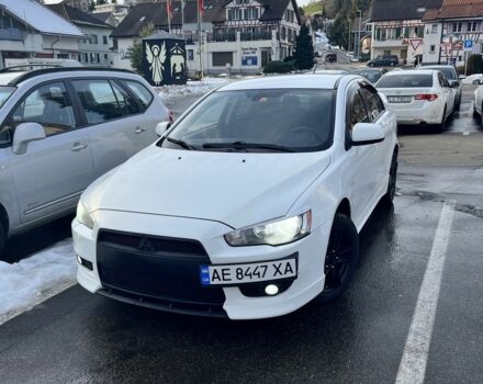 Белый Мицубиси Лансер, объемом двигателя 2 л и пробегом 256 тыс. км за 4900 $, фото 1 на Automoto.ua