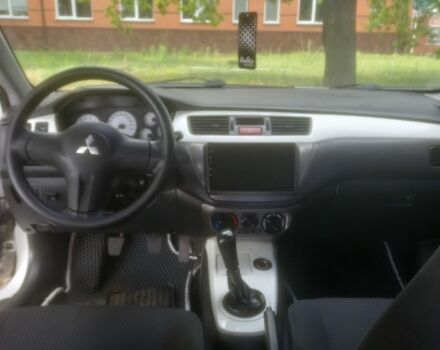 Белый Мицубиси Лансер, объемом двигателя 0 л и пробегом 235 тыс. км за 5000 $, фото 1 на Automoto.ua