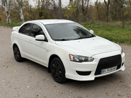 Белый Мицубиси Лансер, объемом двигателя 1.5 л и пробегом 265 тыс. км за 5600 $, фото 1 на Automoto.ua