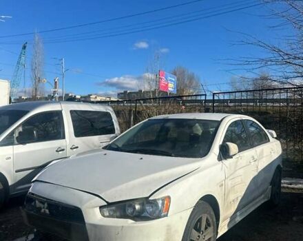 Белый Мицубиси Лансер, объемом двигателя 2 л и пробегом 210 тыс. км за 2800 $, фото 1 на Automoto.ua