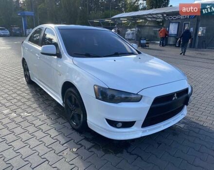 Білий Міцубісі Lancer, об'ємом двигуна 1.8 л та пробігом 215 тис. км за 7000 $, фото 1 на Automoto.ua