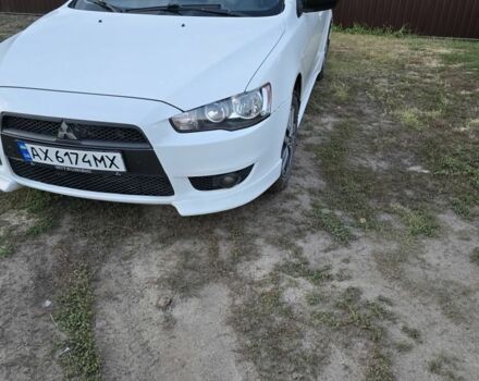 Белый Мицубиси Лансер, объемом двигателя 2 л и пробегом 262 тыс. км за 5000 $, фото 1 на Automoto.ua