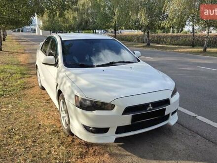 Міцубісі Lancer 2009 у Новомосковске на Automoto.ua Білий Міцубісі Lancer, об'ємом двигуна 2 л та пробігом 185 тис. км за 7600 $, фото 1 на Automoto.ua