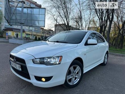 Білий Міцубісі Lancer, об'ємом двигуна 1.8 л та пробігом 262 тис. км за 6500 $, фото 1 на Automoto.ua