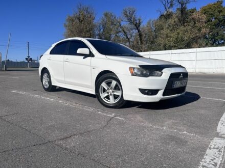 Білий Міцубісі Lancer, об'ємом двигуна 1.8 л та пробігом 160 тис. км за 8500 $, фото 1 на Automoto.ua