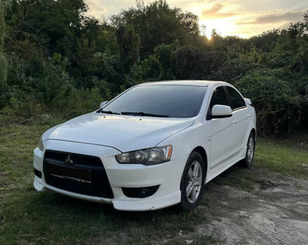 Білий Міцубісі Lancer, об'ємом двигуна 2 л та пробігом 269 тис. км за 6000 $, фото 1 на Automoto.ua