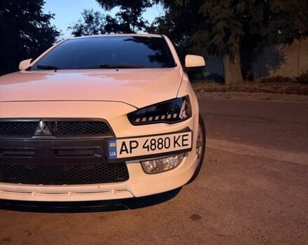 Белый Мицубиси Лансер, объемом двигателя 2 л и пробегом 236 тыс. км за 6500 $, фото 1 на Automoto.ua