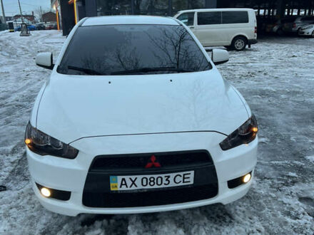 Білий Міцубісі Lancer, об'ємом двигуна 2 л та пробігом 185 тис. км за 7600 $, фото 1 на Automoto.ua
