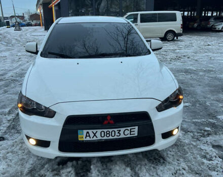Білий Міцубісі Lancer, об'ємом двигуна 2 л та пробігом 185 тис. км за 7600 $, фото 1 на Automoto.ua