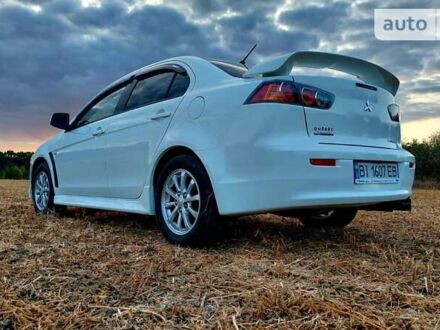 Міцубісі Lancer 2010 у Полтаві на Automoto.ua Білий Міцубісі Lancer, об'ємом двигуна 2 л та пробігом 99 тис. км за 6999 $, фото 1 на Automoto.ua