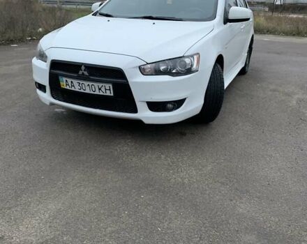 Білий Міцубісі Lancer, об'ємом двигуна 1.8 л та пробігом 214 тис. км за 7000 $, фото 1 на Automoto.ua