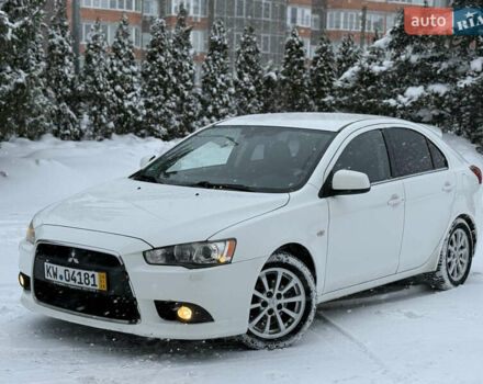 Белый Мицубиси Лансер, объемом двигателя 1.6 л и пробегом 225 тыс. км за 6250 $, фото 1 на Automoto.ua