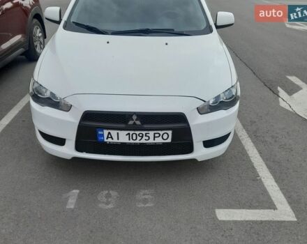 Белый Мицубиси Лансер, объемом двигателя 1.5 л и пробегом 243 тыс. км за 6200 $, фото 1 на Automoto.ua
