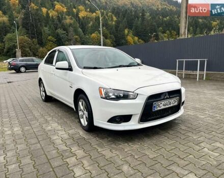 Білий Міцубісі Lancer, об'ємом двигуна 1.8 л та пробігом 258 тис. км за 6500 $, фото 1 на Automoto.ua